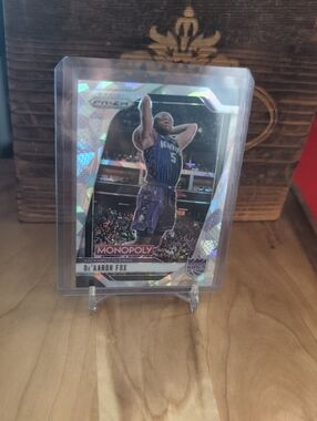 2024-25 Monopoly Prizm De'Aaron Fox Cracked Ice Prizm Kings Spurs